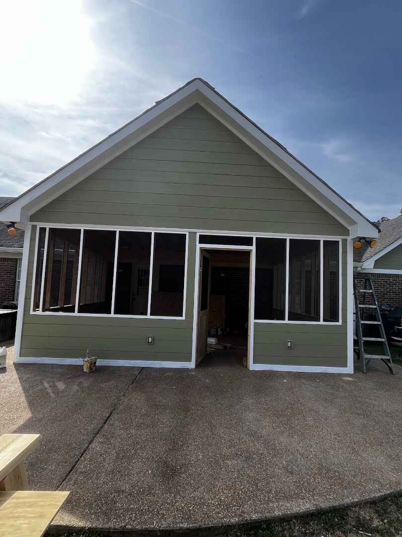 Porch addition after — completed by Galvez Construction North MS