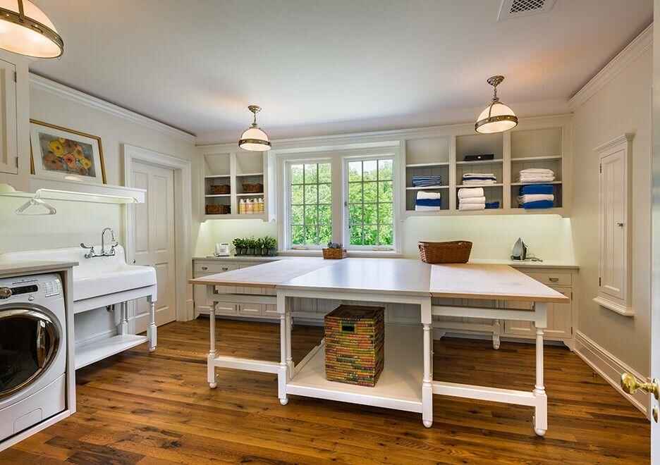 Spacious dedicated laundry room after closet conversion remodel
