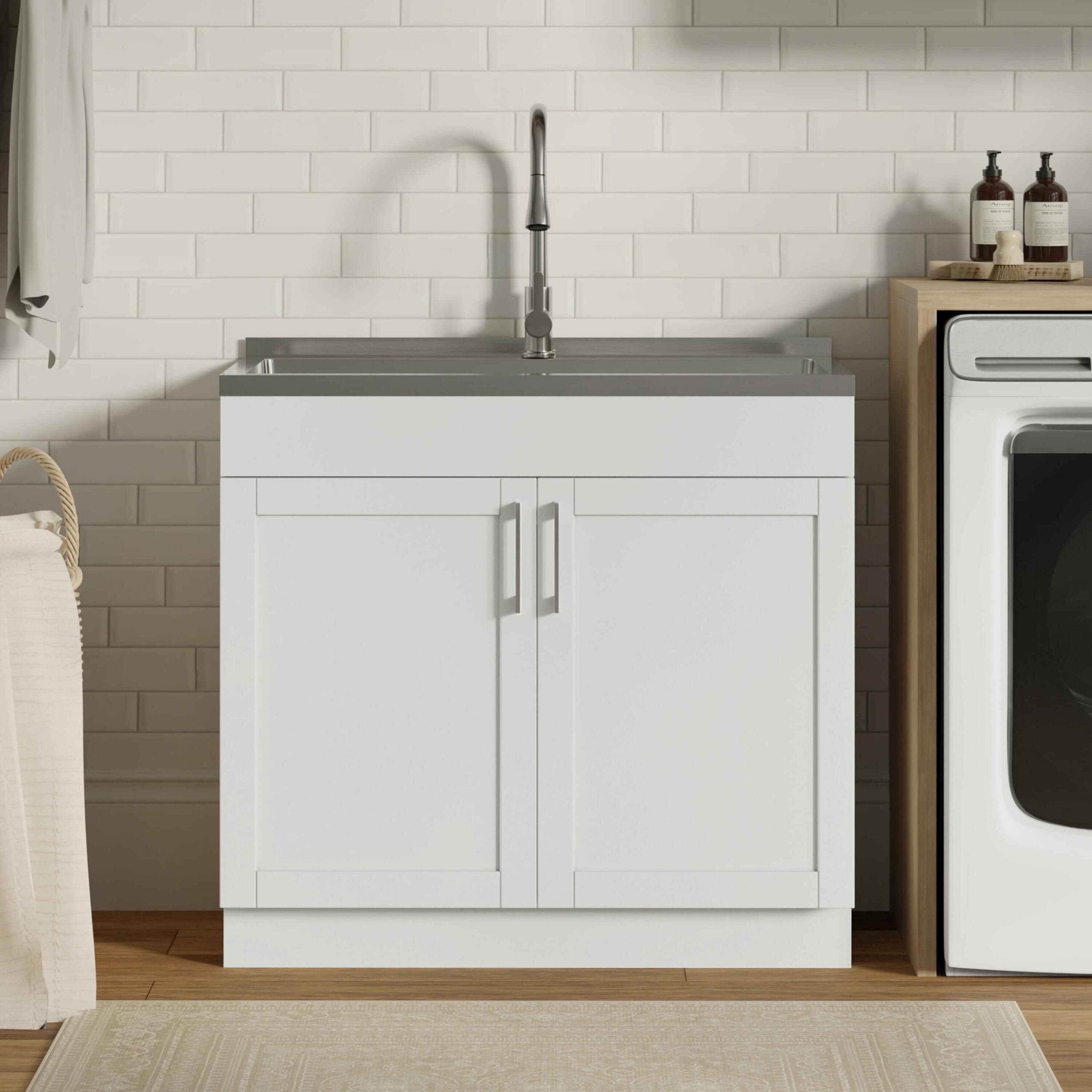 Utility sink and cabinet installation for laundry room remodeling