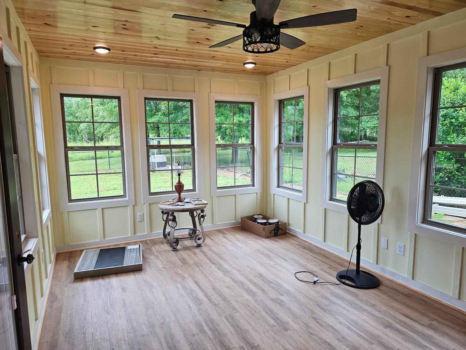 Sunroom with 10 single-hung windows installed by Galvez Construction in Mantachie, MS